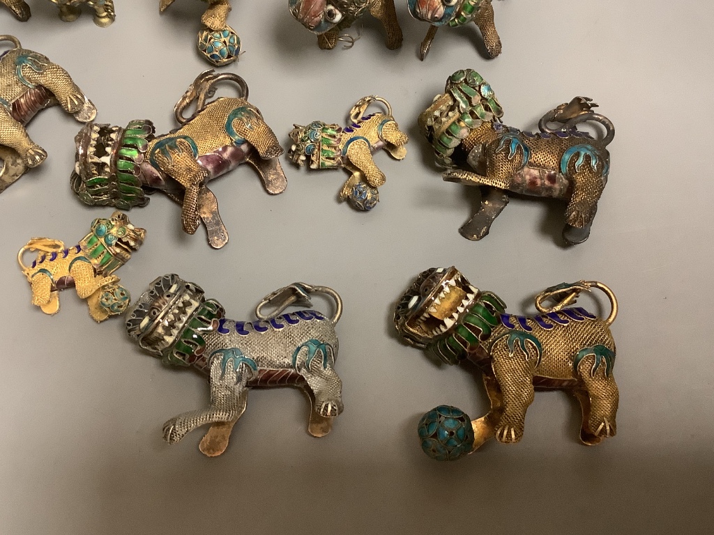 A quantity of Chinese enamelled gilt metal Buddhistic lions